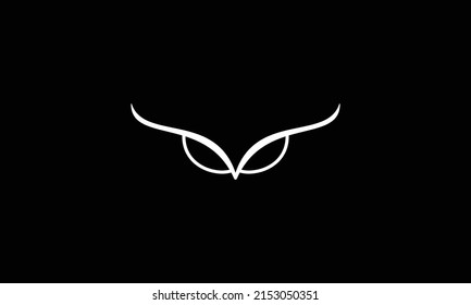 Owl Logo. Owl eye vector silhouette on black background