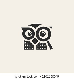 Owl with magnifying glass silhouette logo