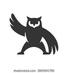 Owl mascot standing in an aggressive ready stance for sports team