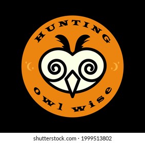 An owl is a nocturnal bird of prey with large forward-facing eyes surrounded by facial disks, a hooked beak.