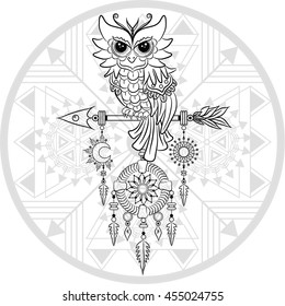 Owl on the arrow with sun and moon medallions on the shaman drum background. Boho chic style.