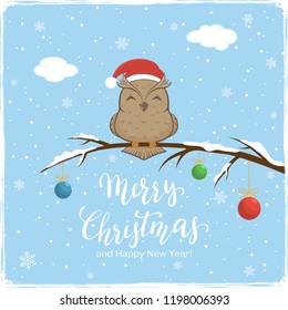 Owl with Santa's hat on branch with snow and colored Christmas balls. Lettering Merry Christmas and Happy New Year on blue winter background, illustration.