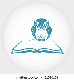 owl sat on the edge of the book