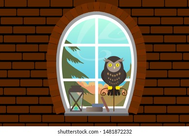 An owl sitting in a house of bricks on a perch by the window, in which you can see the autumn landscape, Christmas tree, forest and clear blue sky.