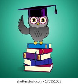 Owl sitting on books.