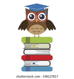 Owl sitting on books.