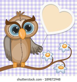 Owl is sitting on a branch