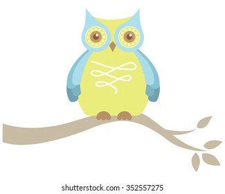 Owl sitting on branch
