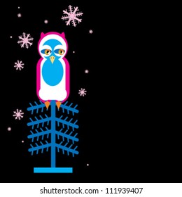 Owl sitting on a Christmas tree at night.