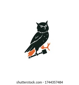 Owl symbol of wisdom. Heraldic owl passant of a family crest. Vintage bird vector emblem. Black silhouette logo design, engraving, retro style.