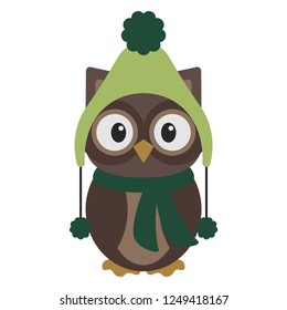 Owl in Winter Clothes - Owl wearing green beanie hat with pompoms and green scarf
