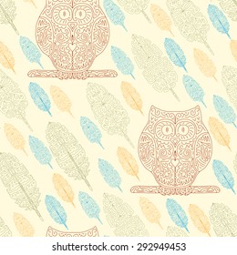 Owls and Feathers seamless pattern 