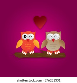 Owls in love sitting on a tree - valentine's card.