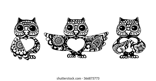 Owls vector illustration. Set of owls. Isolated owl birds in tribal style. Owl with heart on light background.