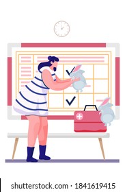 The owner of the bunny is standing with a pet in her hands. Hare climbs on a red first aid kit. Schedule with notes on background. Woman and her rabbits sitting at home. Girl is stroking the animal