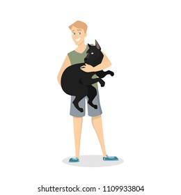 Owners with pets. Man standing and holding dog.