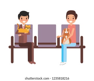 owners with rabbit and cat waiting on chairs