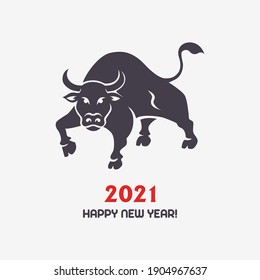 Ox silhouette with "happy new year 2021" title. Vector greeting card for new year with stylized angry black bull and greeting text on white background.
