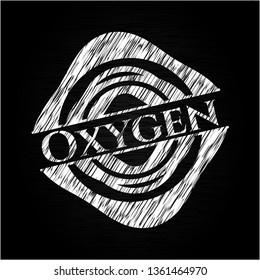 Oxygen chalkboard emblem on black board