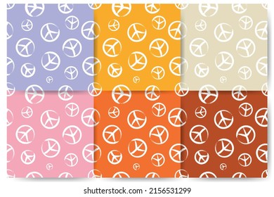 Pacifist sign in doodle style. Set of seamless patterns.