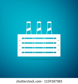Pack of beer bottles icon isolated on blue background. Case crate beer box sign. Flat design. Vector Illustration
