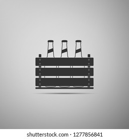 Pack of beer bottles icon isolated on grey background. Wooden box and beer bottles. Case crate beer box sign. Flat design. Vector Illustration