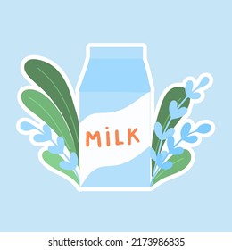 A pack of milk in the grass. sticker. Milk day. Flat illustration. Vector