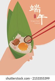 Pack rice dumpling with Chopsticks.  Dragon Boat Festival traditional food to eat. Translation: Duanwu Festival, May fifth.