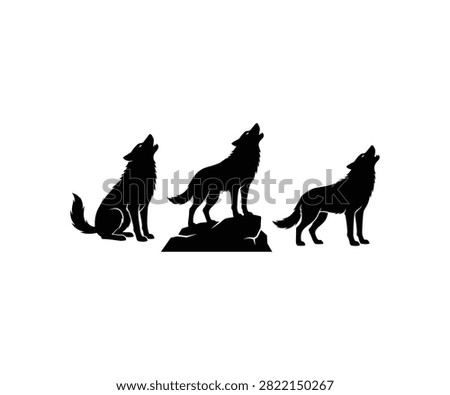 Pack of wild wolves howling silhouette landscape
