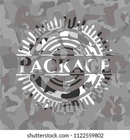 Package on grey camouflaged texture