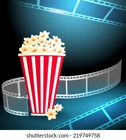 Package with popcorn in the blue background with curving film strip 