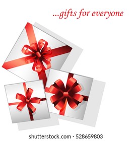 packaged gifts with red ribbons bows on white 