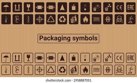 Packaging symbols.Set of black and white packaging symbols on a cardboard background.Compliance signs, Manipulation signs,Environmental signs, Warning signs .For boxes, infographics, infographics.