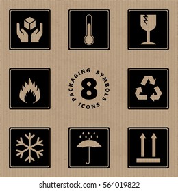 Packaging Symbols Handle with Care Storage Temperature Fragile Flammable Recycle Freezable Keep Dry This Way Up 8 Icons Set - Black Inverted Elements on Cardboard Background - Stamp Stencil Style