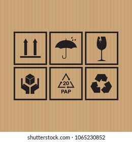 Packaging symbols set on cardboard background. Vector illustration