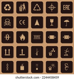 Colección de iconos de embalaje, incluyendo frágiles, manejo con cuidado, inflamables y otros signos.