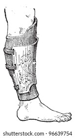 Pad (armor) on human leg, vintage engraved illustration. Dictionary of words and things - Larive and Fleury - 1895.
