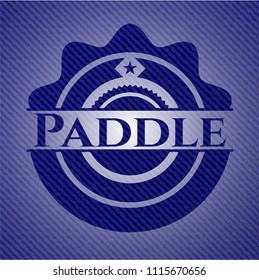 Paddle badge with denim background