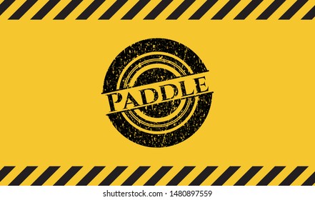 Paddle black grunge emblem with yellow background. Vector Illustration. Detailed.