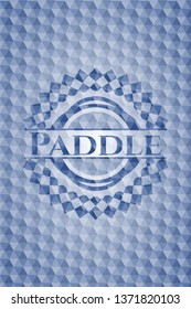 Paddle blue emblem with geometric pattern background.