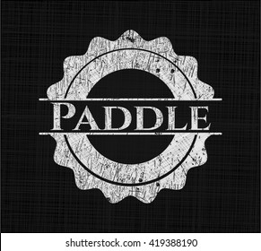 Paddle chalk emblem written on a blackboard