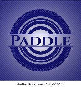 Paddle emblem with denim high quality background. Vector Illustration. Detailed.