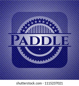 Paddle emblem with jean background