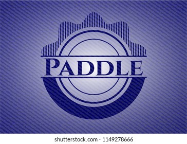 Paddle emblem with jean background