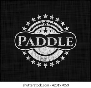 Paddle written on a blackboard