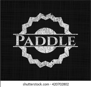 Paddle written on a chalkboard