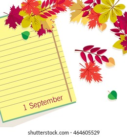 Page Notepad with pencil on background of autumn leaves. Back to school.