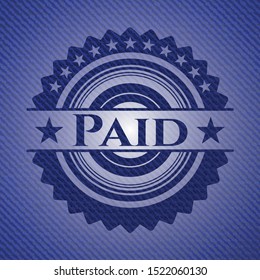 Paid badge with denim background. Vector Illustration. Detailed.