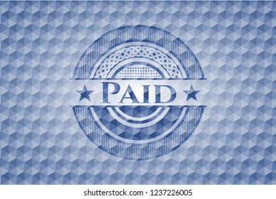 Paid blue emblem with geometric pattern.