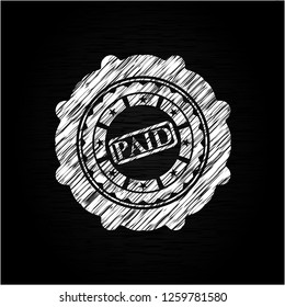 paid icon drawn on blackboard